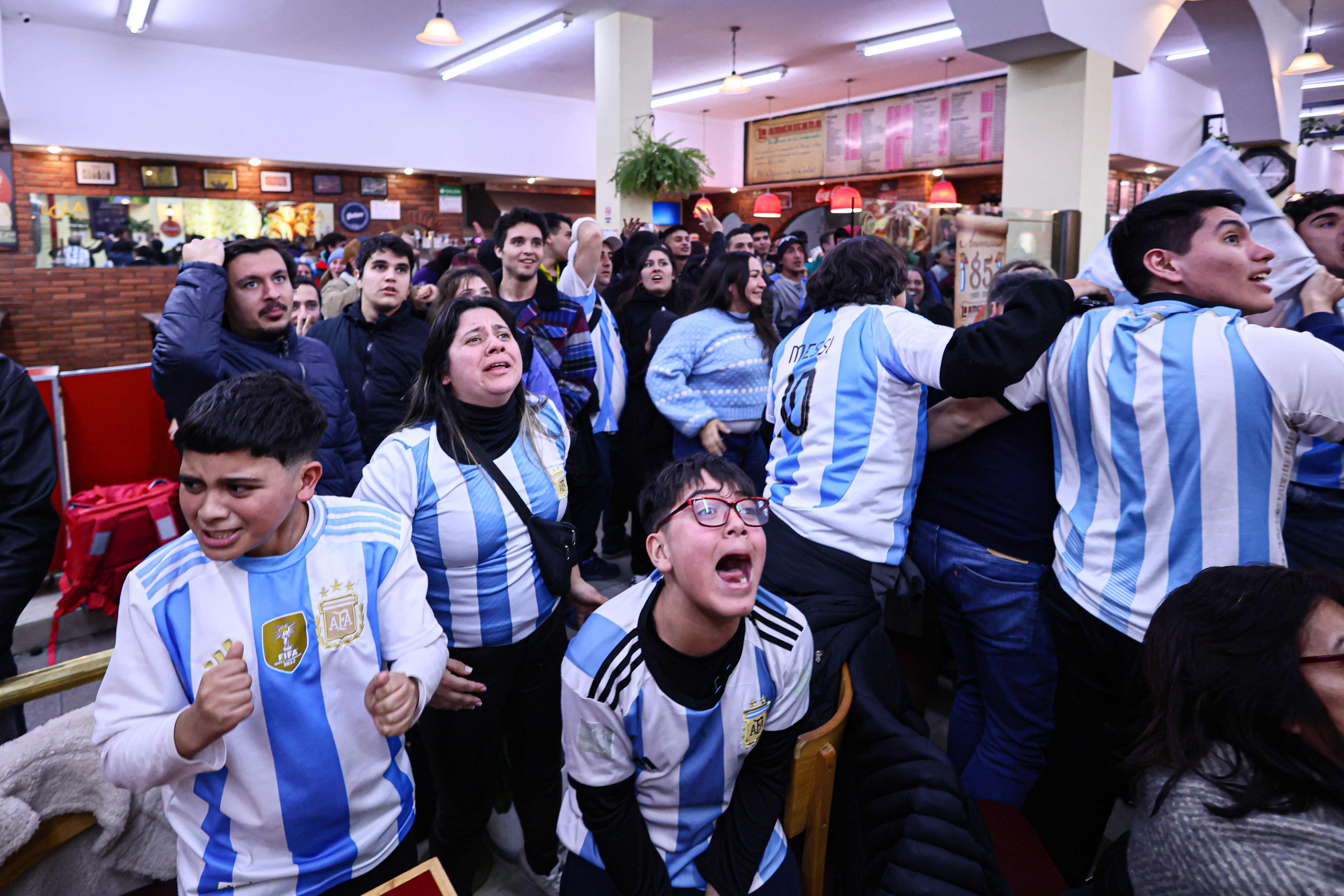 IMG_1077 BUENOS AIRES, ARGENTINA - July 14: Argentine fans react today in a restaurant watching the Argent...