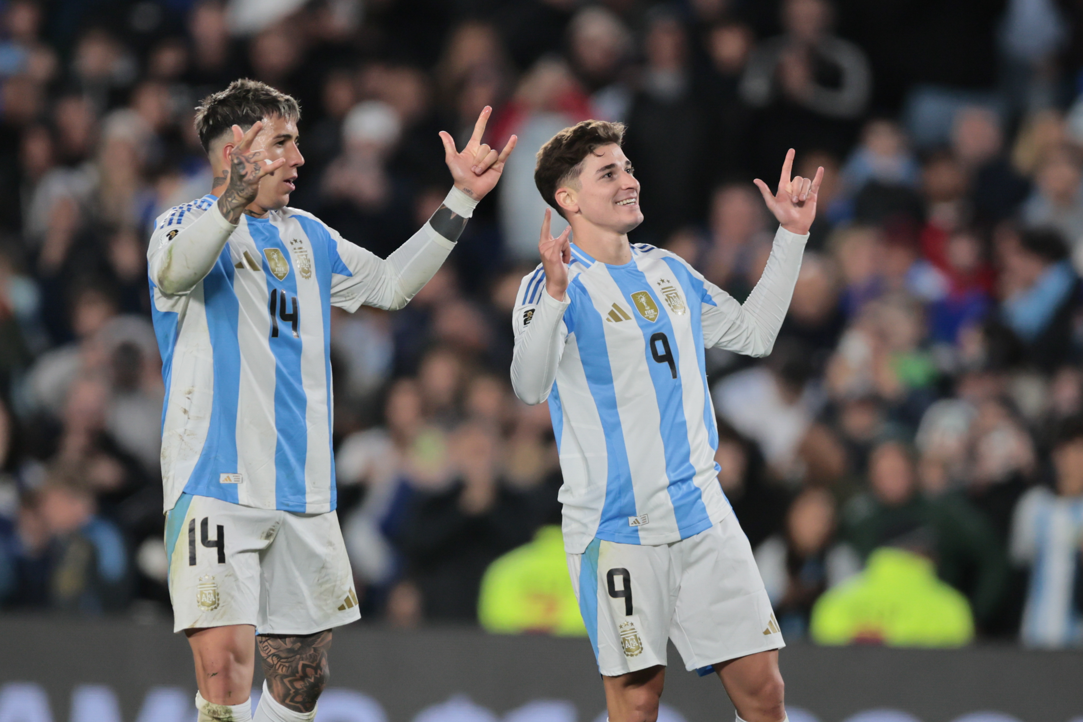 "Argentina vs Chile" 2024 Buenos Aires, Argentina - September 5, 2024. Enzo Fernández (left) celebrates with the scorer of...