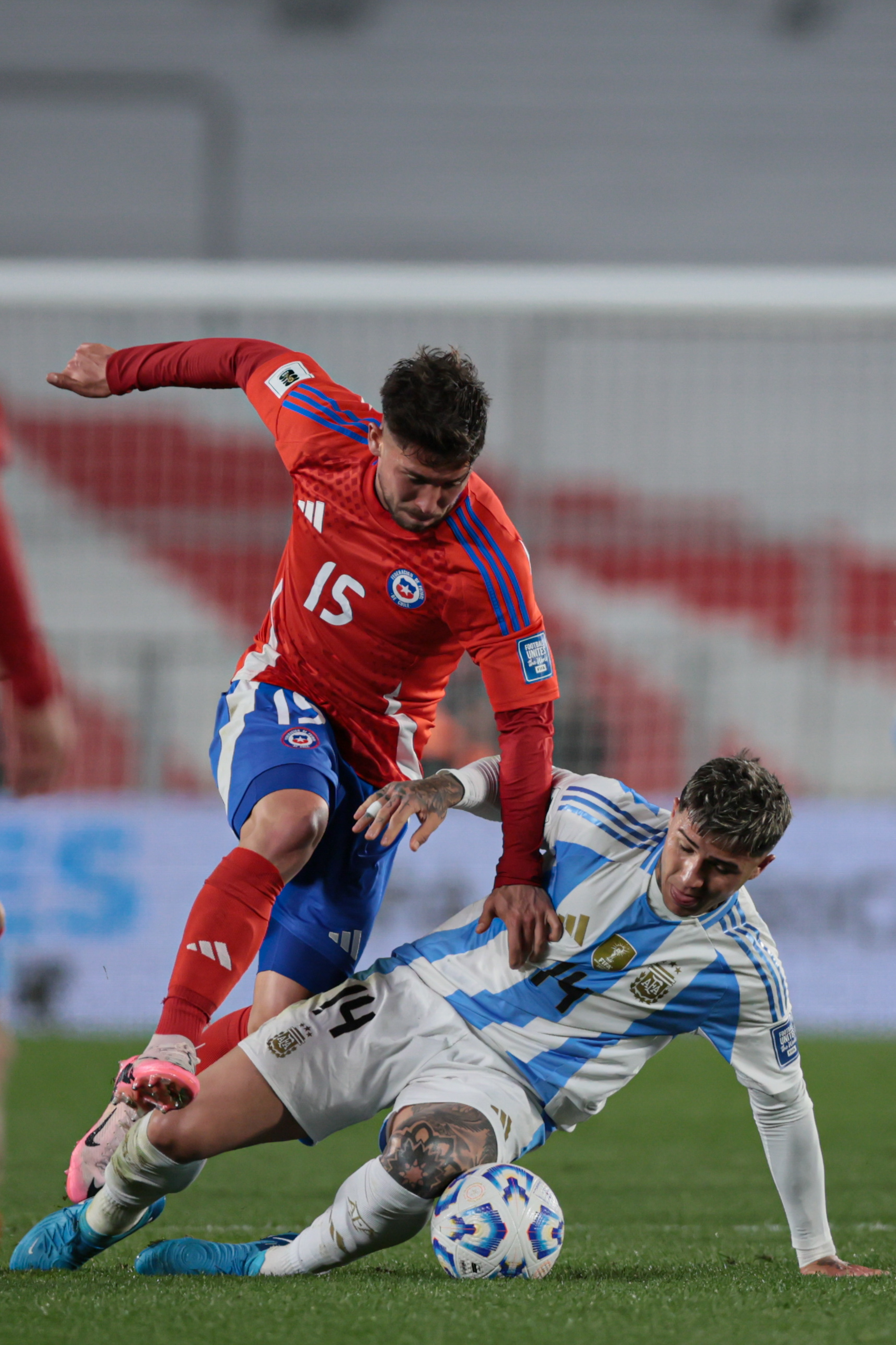 "Argentina vs Chile" 2024 Buenos Aires, Argentina - September 5, 2024. Chilean midfielder Felipe Loyola (left) fights for t...