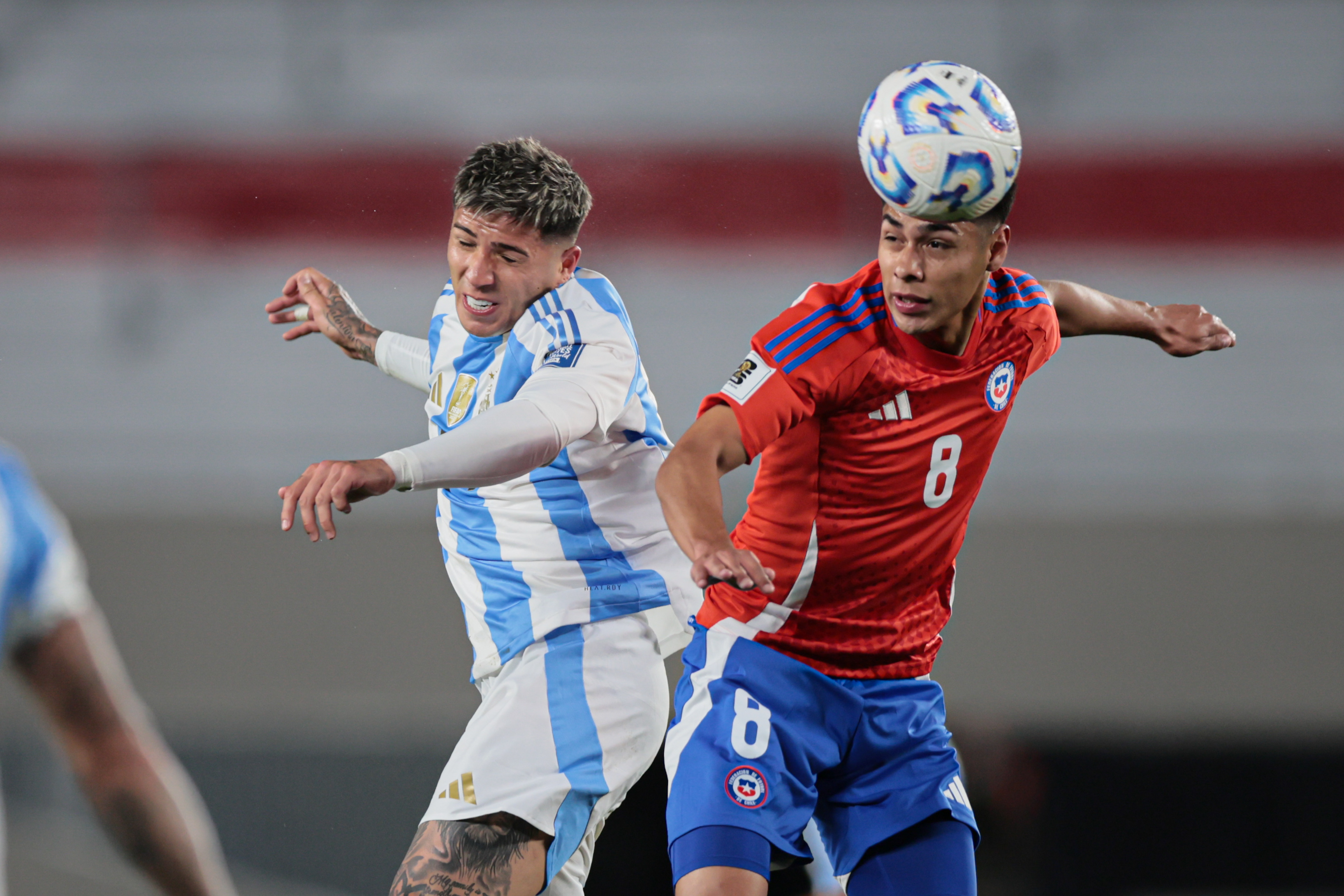 "Argentina vs Chile" 2024 Buenos Aires, Argentina - September 5, 2024. Argentine midfielder Enzo Fernández (left) fights f...