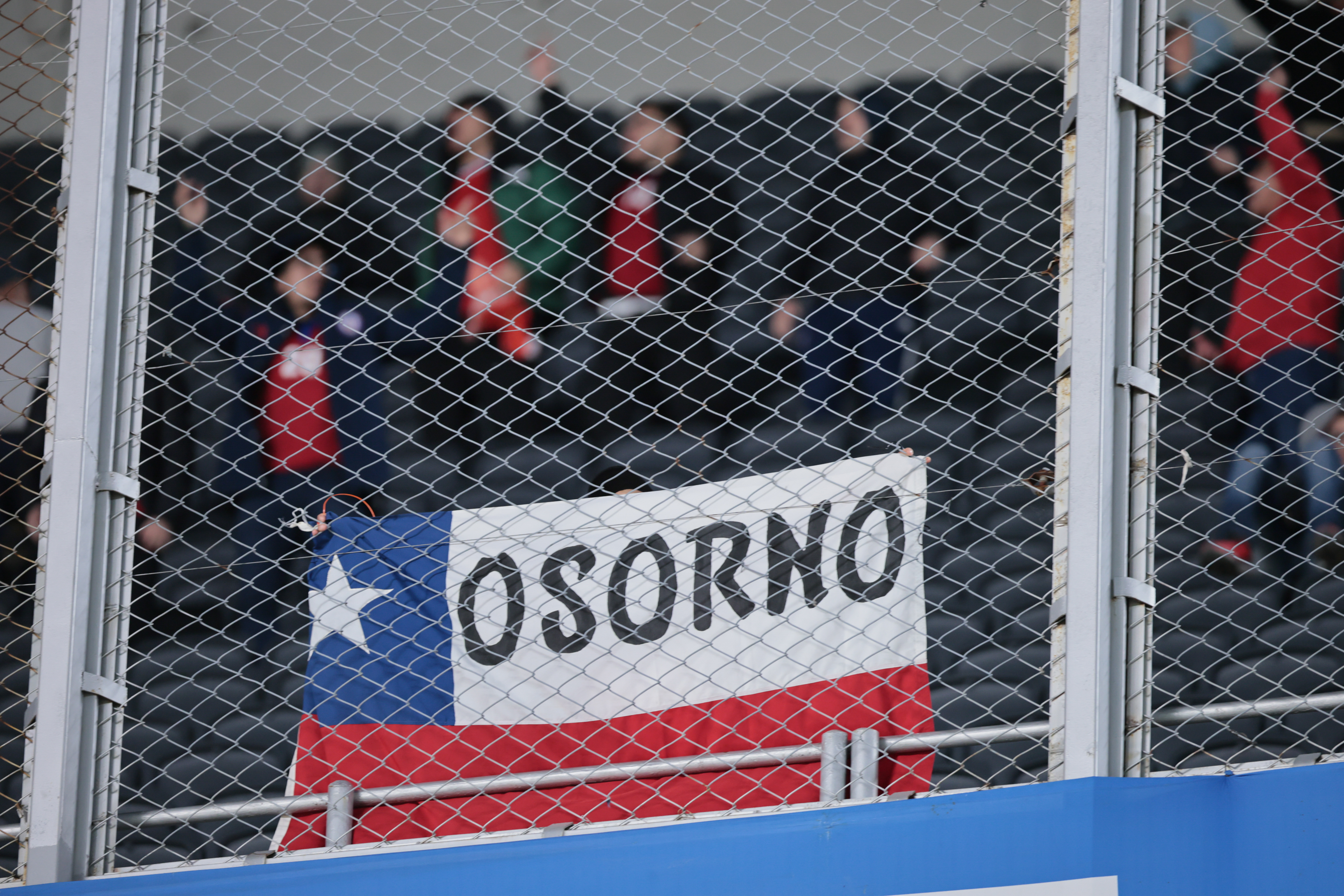 Buenos Aires, Argentina - September 5, 2024. Chilean fans from the town of Osorno unfurl a flag a...
