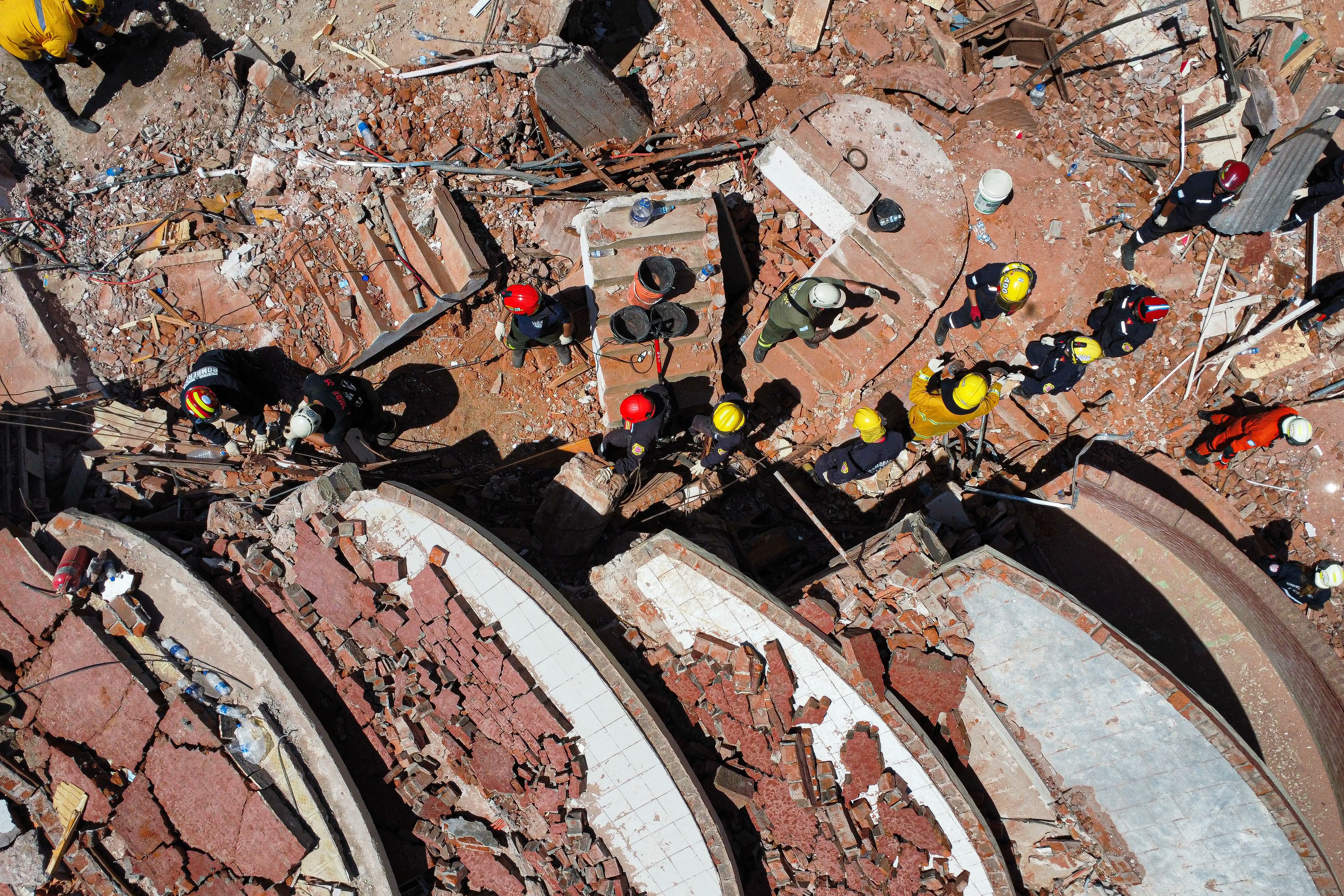 Villa Gesell, Argentina - October 30, 2024: Search and rescue operations continue at the collapse...