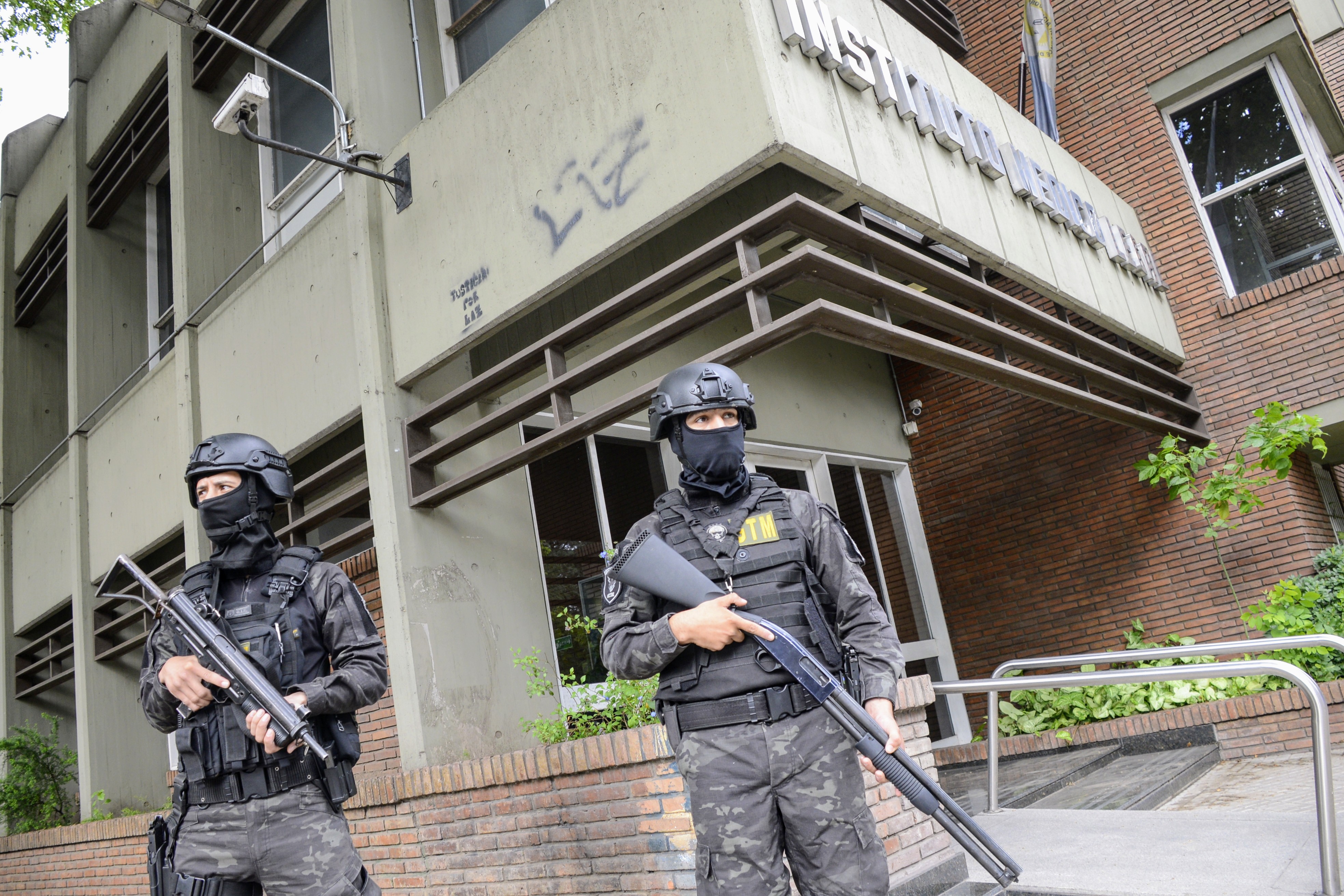 Buenos Aires, Argentina - November 11, 2024: Police officers stand guard outside the facilities o...
