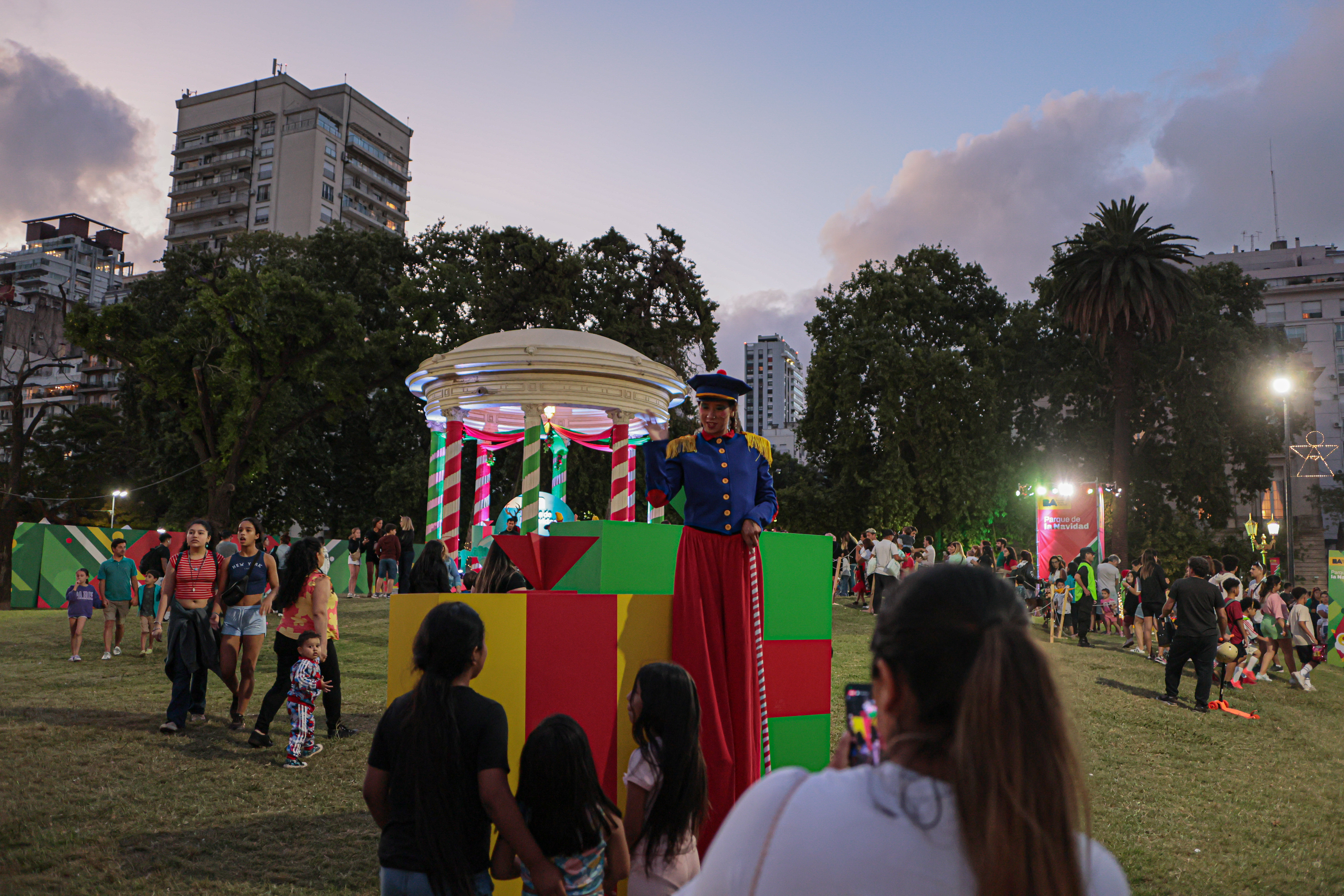 Buenos Aires, Argentina - December 25, 2024: Visitors enjoy the festive atmosphere at Plaza Seebe...