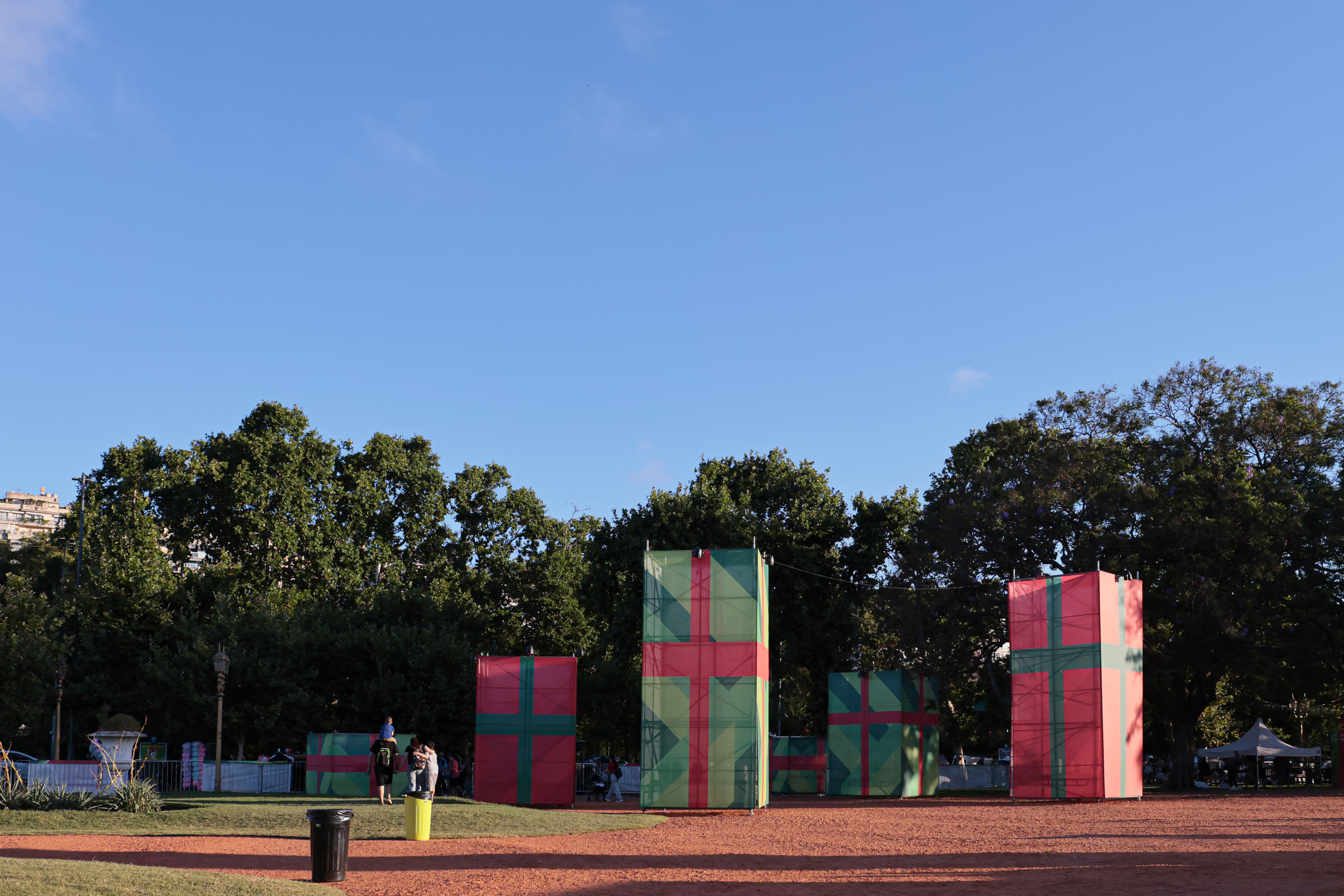 Families Celebrate the Holidays at Palermo’s Christmas Park Buenos Aires, Argentina - December 25, 2024: Visitors enjoy the festive atmosphere at Plaza Seebe...