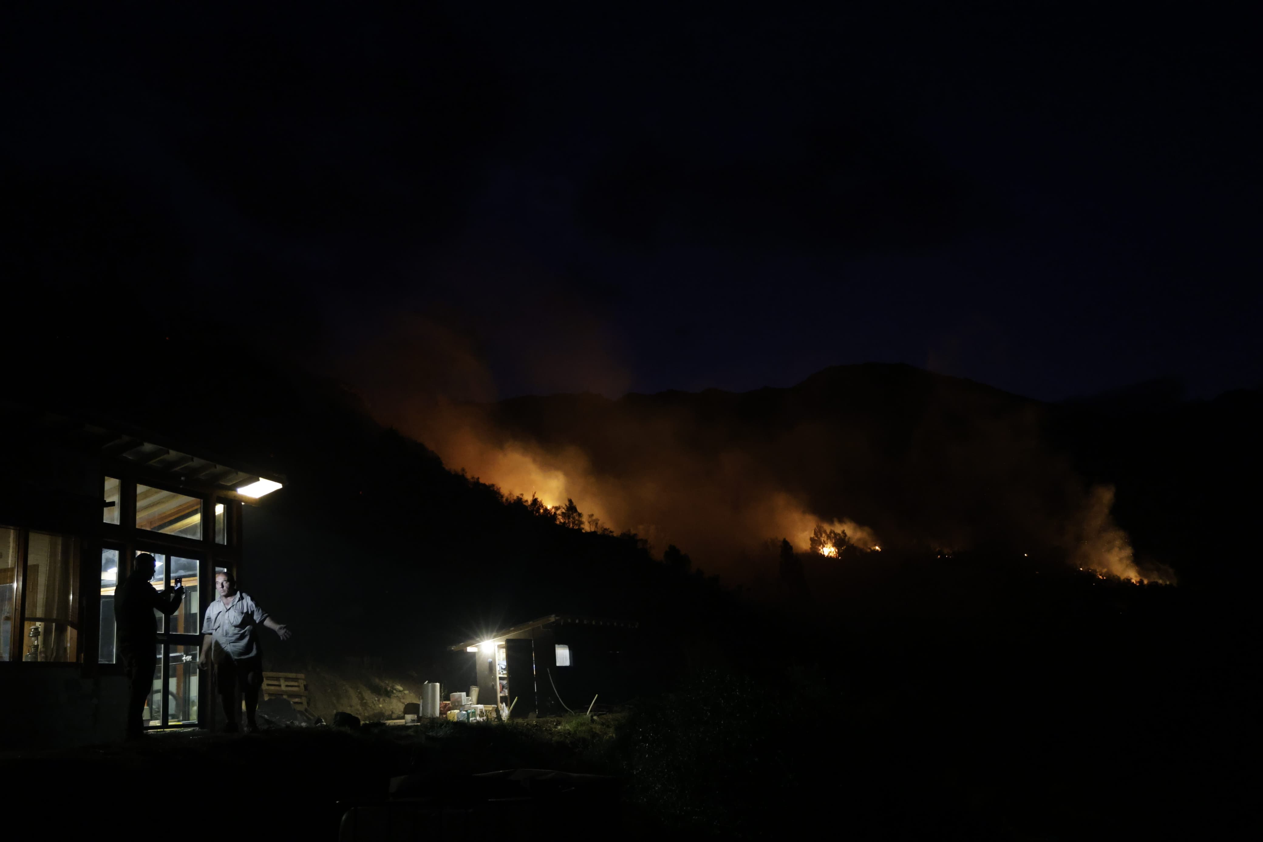 Epuyén, Argentina - January 16,  2025: Firefighters in Epuyén worked tirelessly until past 9 PM...