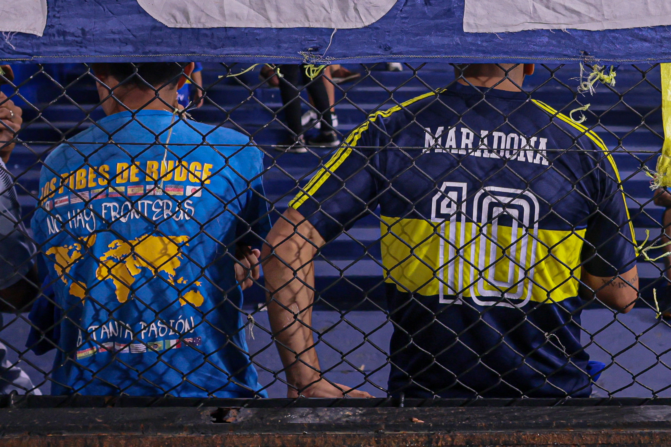 Boca Juniors Seeks Comeback Against Alianza Lima to Stay in Libertadores Race Buenos Aires, Argentina – February 25, 2025: Boca Juniors supporters with Maradona T-shirts. B...