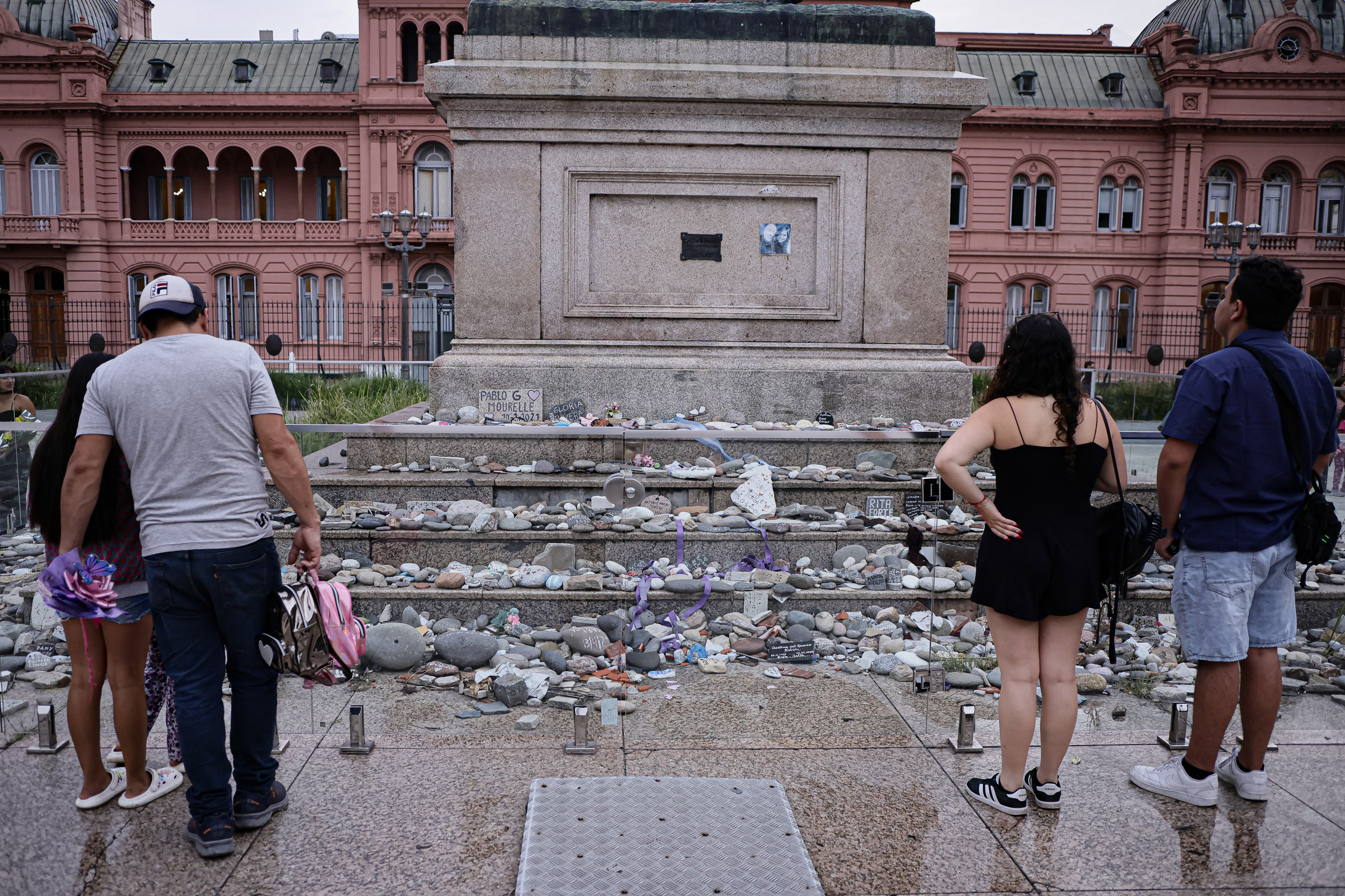 Located in the Plaza de Mayo in front of the Casa Rosada. The tribute consists of stones with the names of the deceased. Buenos Aires, Argentina - Febrero 2025: (File Photo) - People look at the tribute to those who di...