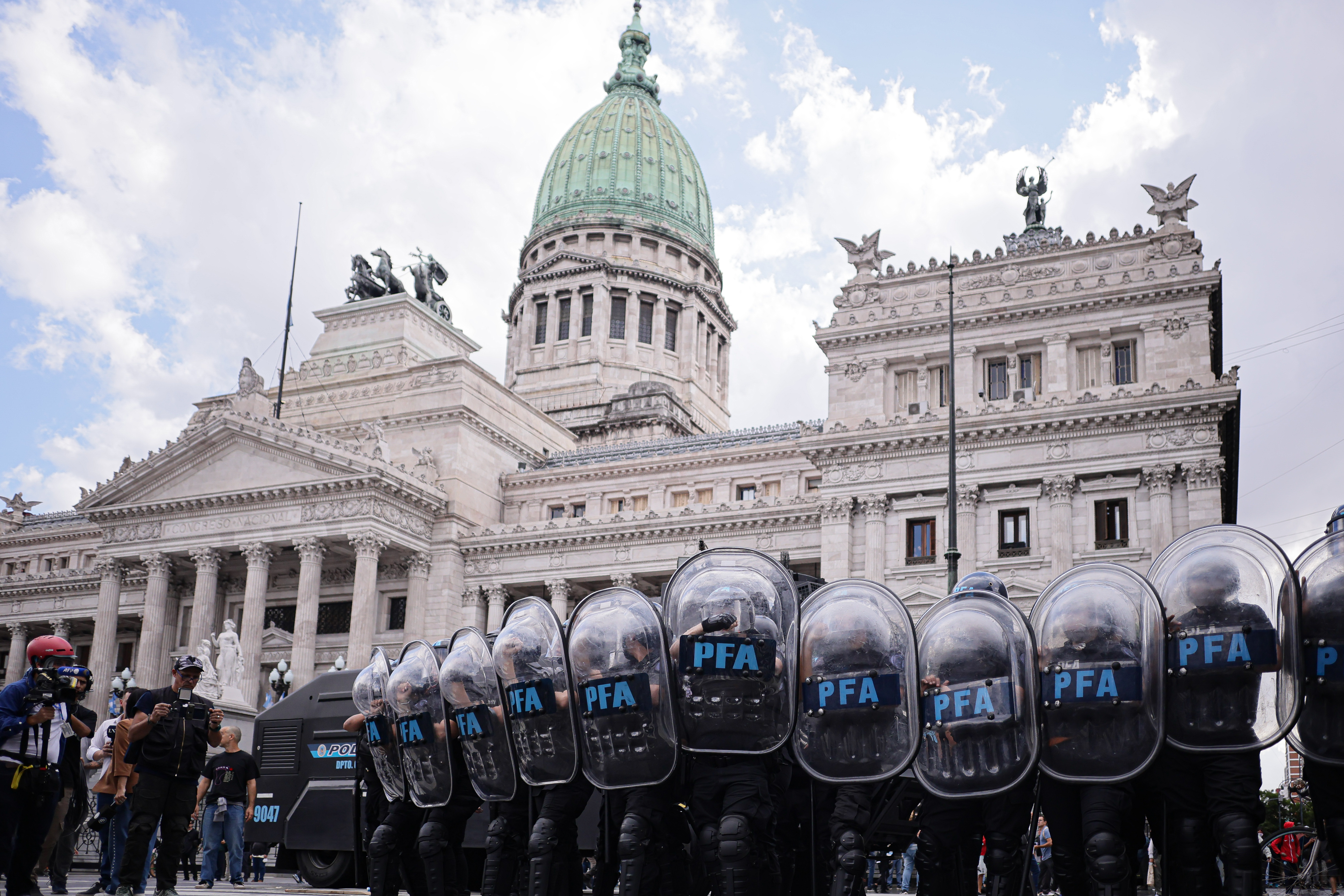 Buenos Aires, Argentina – March 12, 2025: Retirees gathered outside the National Congress deman...