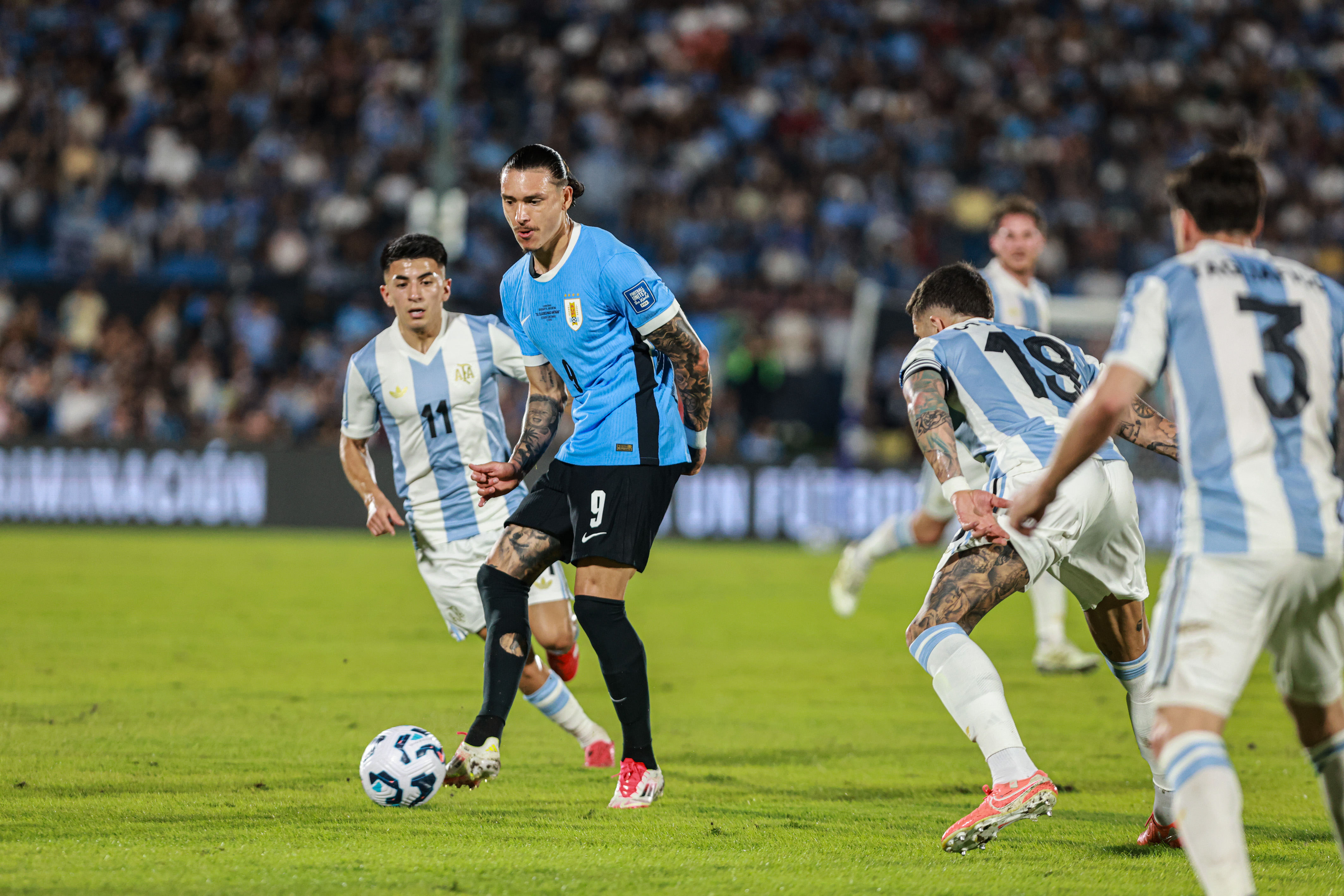 South American Rivals Face Off at Estadio Centenario for Matchday 13 Montevideo, Uruguay – March 21, 2025: Darwin Nuñez from Uruguay control a ball. Uruguay and A...
