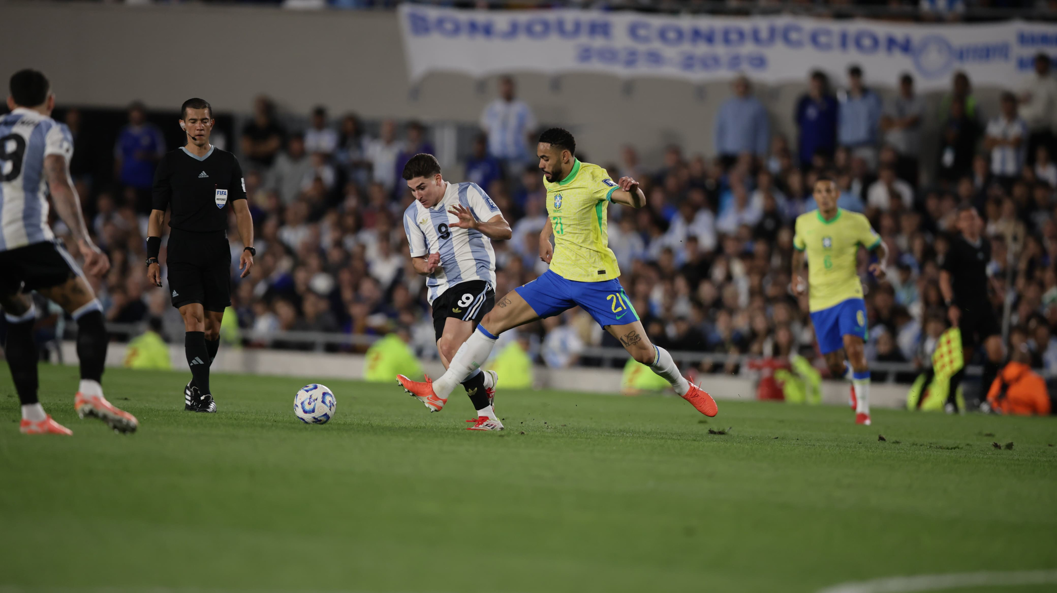 Argentina Faces Brazil in Crucial World Cup Qualifier at Monumental. Buenos Aires, Argentina – March 25, 2025: Julián Álvarez (left) fights for the ball with Math...