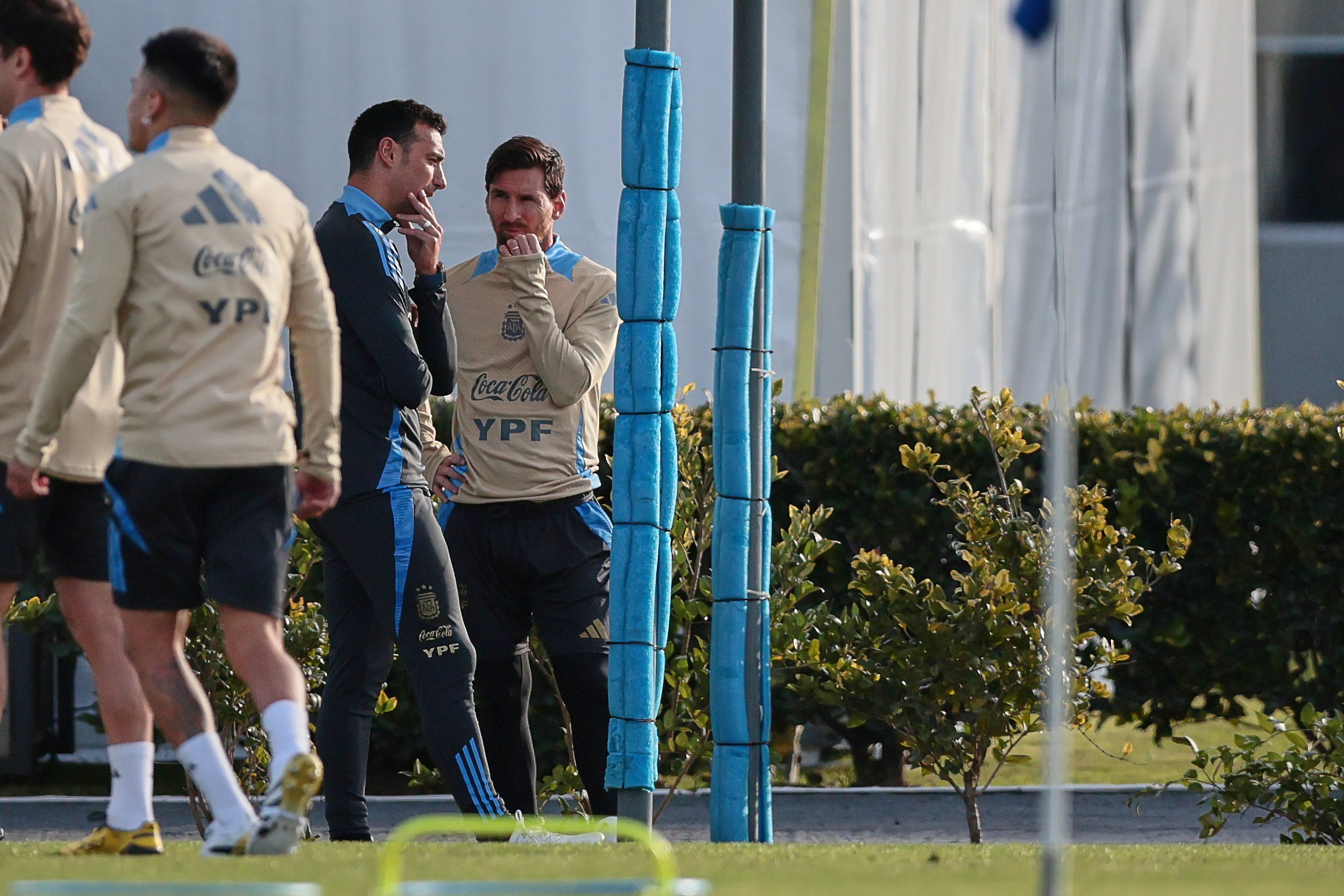 Ezeiza, Argentina - June 3, 2025: Lionel Messi (r) and Lionel Scaloni (2R) talks. Under the watch...