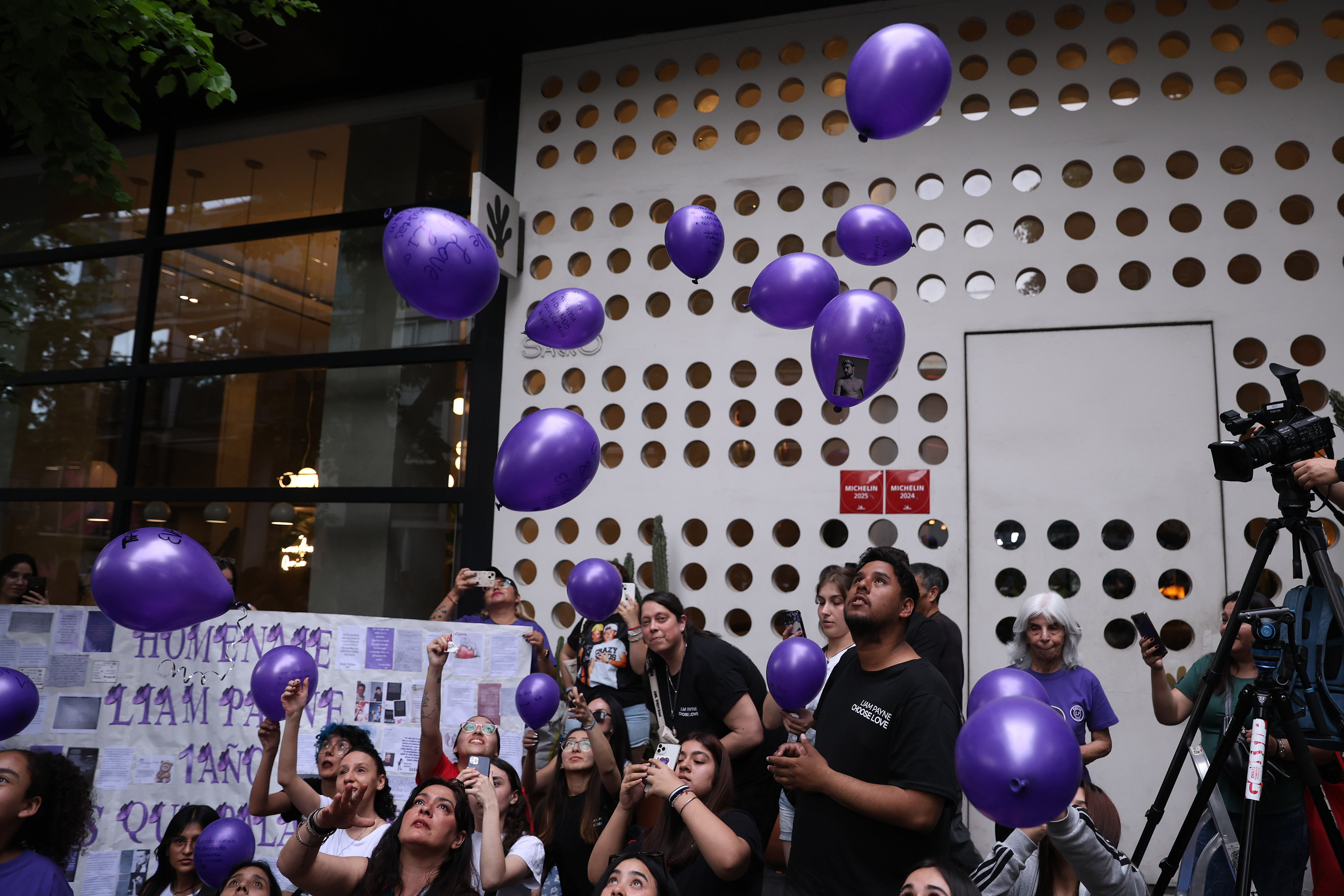 Buenos Aires, Argentina – October 16, 2025: Fans of British singer Liam Payne gathered outside ...