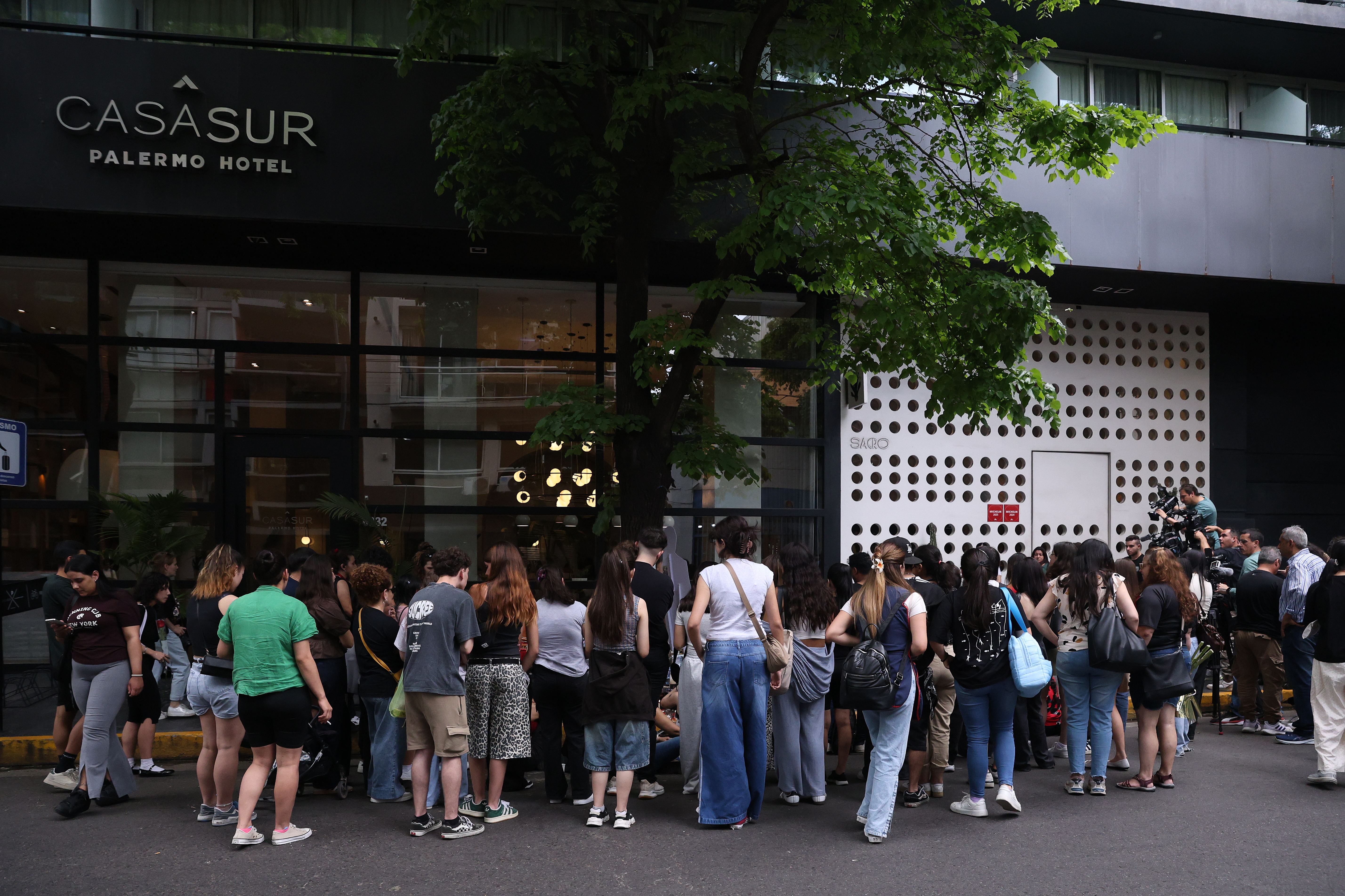 Supporters of the former One Direction member gathered with candles, flowers, and songs at the site of his passing Buenos Aires, Argentina – October 16, 2025: Fans of British singer Liam Payne gathered outside ...