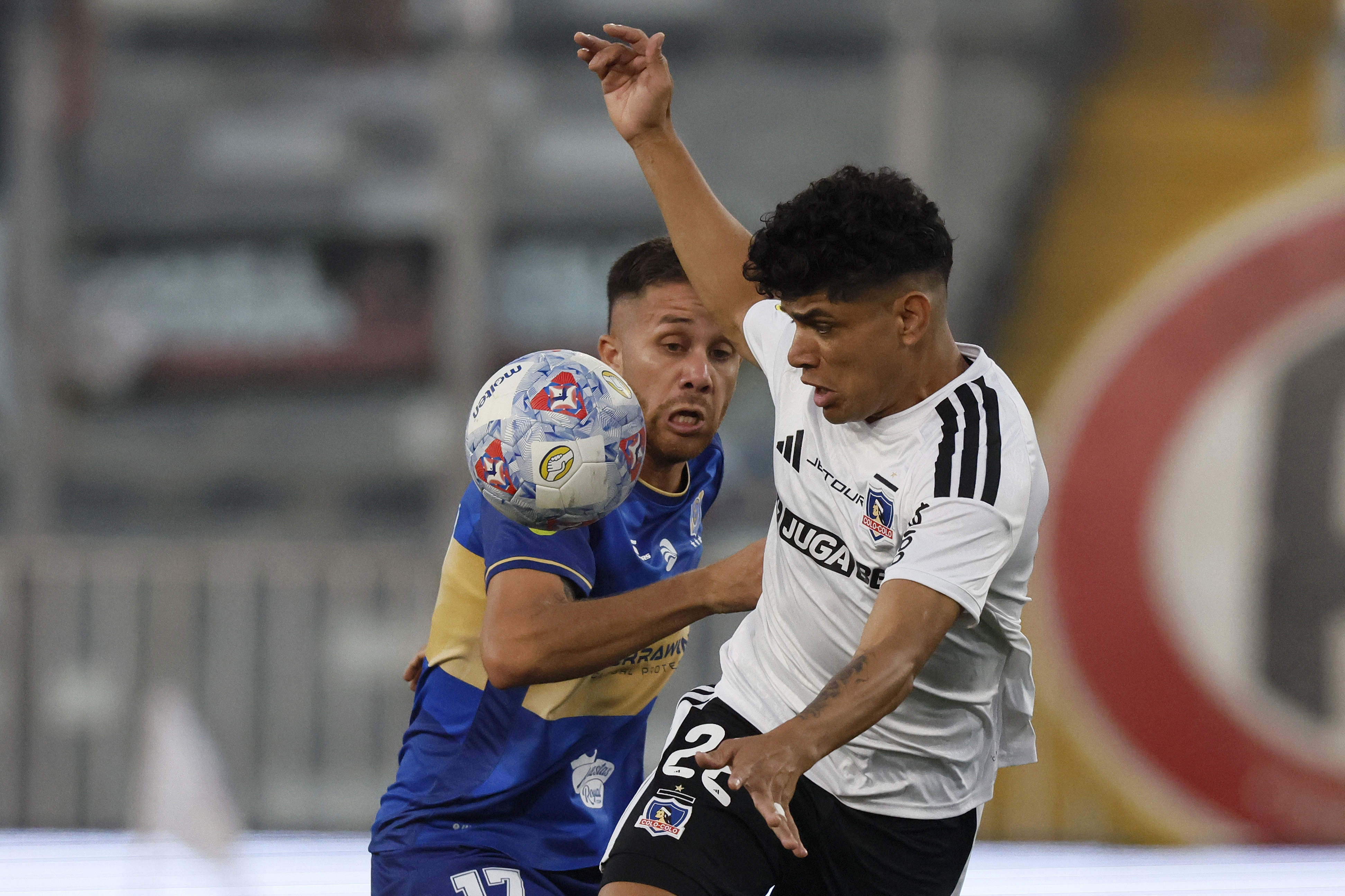 The "Cacique" earned its first three points after a 2-0 win with goals from Javier Correa and Carlos Palacios in Macul Santiago, Chile – February 8, 2026: Colo Colo’s player Claudio Aquino, right, vies for the ba...