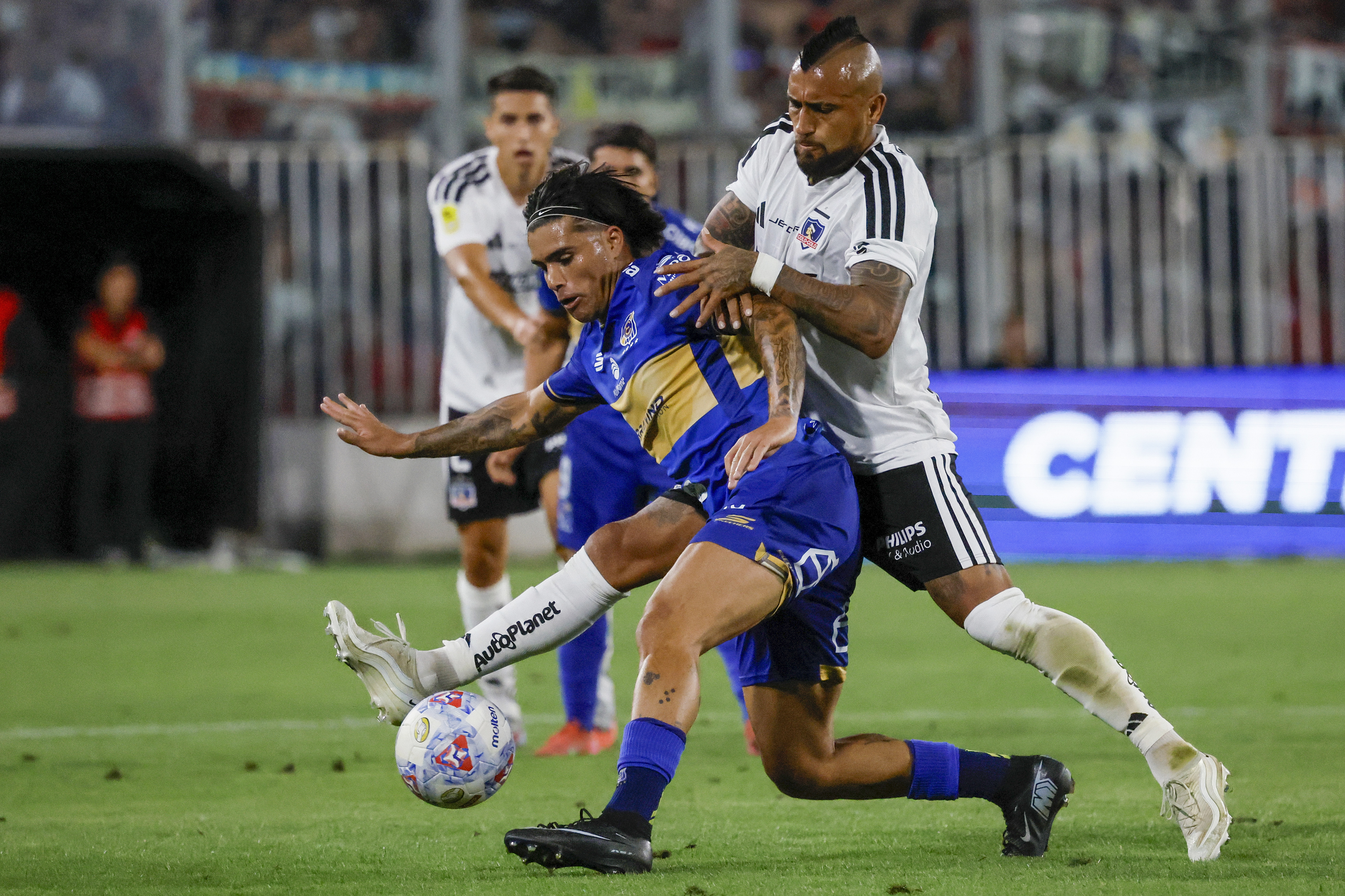 Santiago, Chile – February 8, 2026: Colo Colo’s player Arturo Vidal (R) vies for the ball aga...