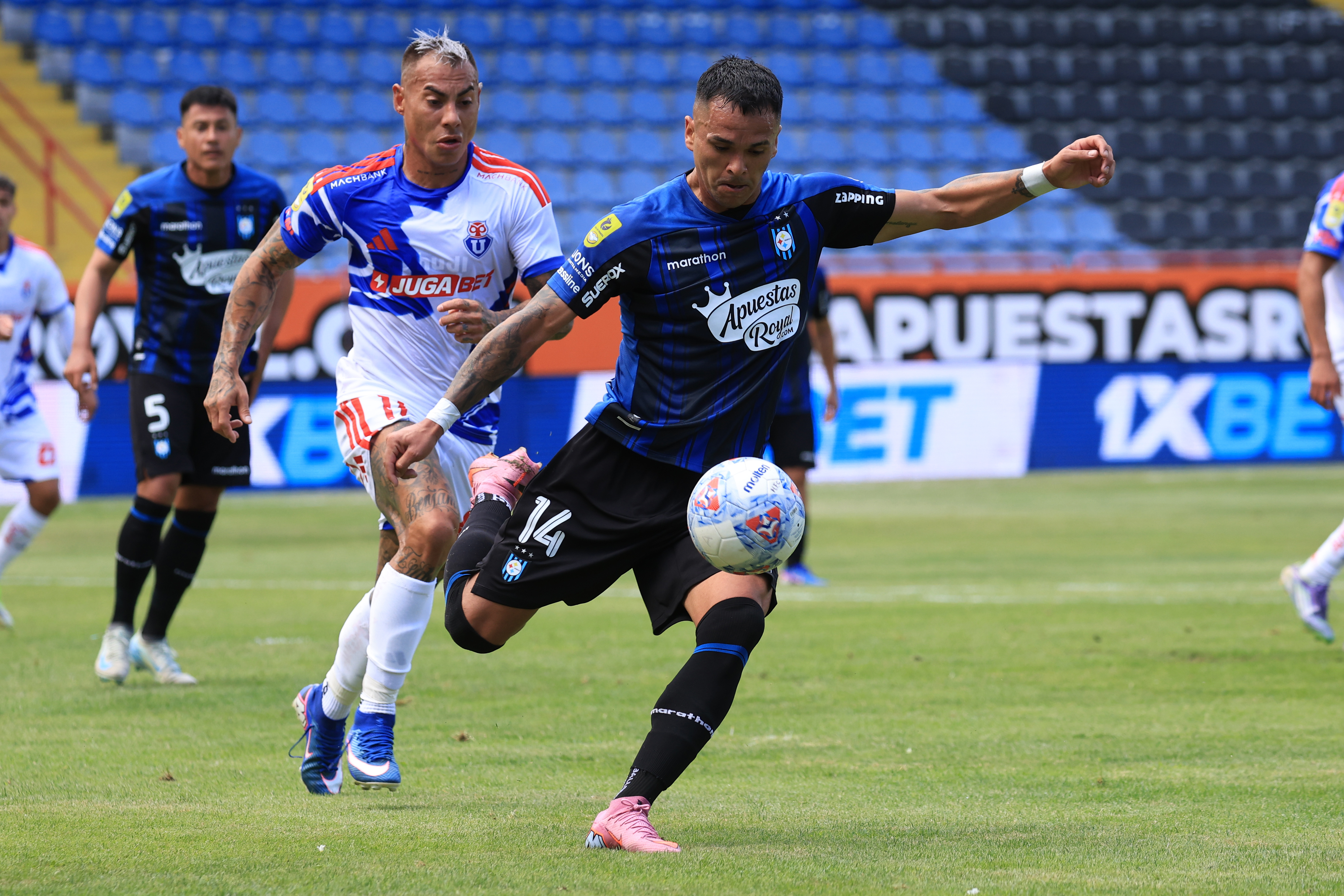 The "Blues" couldn't hold Eduardo Vargas's early lead and suffered their second consecutive defeat in the local tournament Talcahuano, Chile – February 8, 2026: Huachipato Pablo Vargas player, right, play the ball agai...