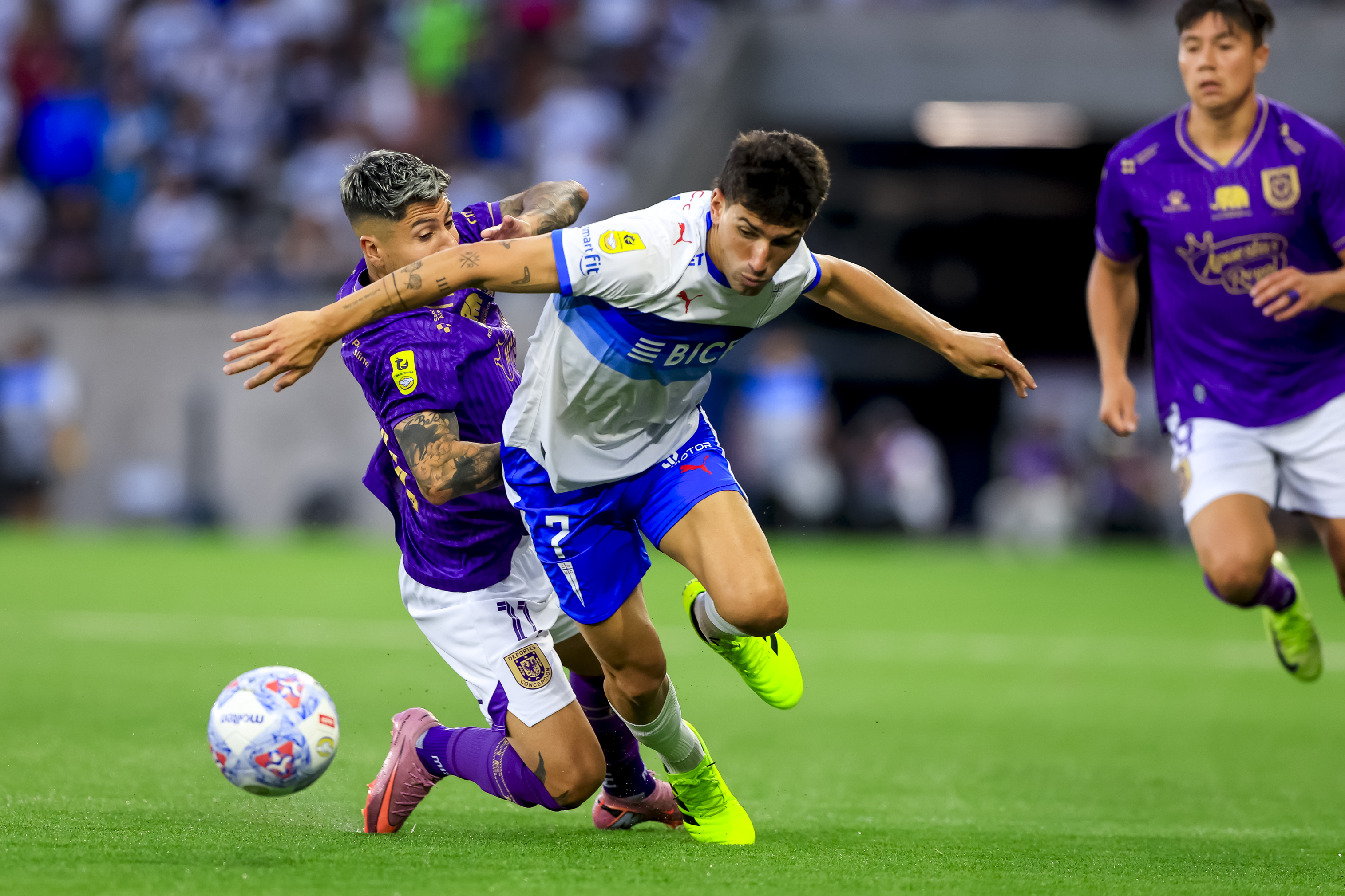 Santiago, Chile – February 8, 2026: Universidad Catolica’s player Justo Giani, right, vies fo...