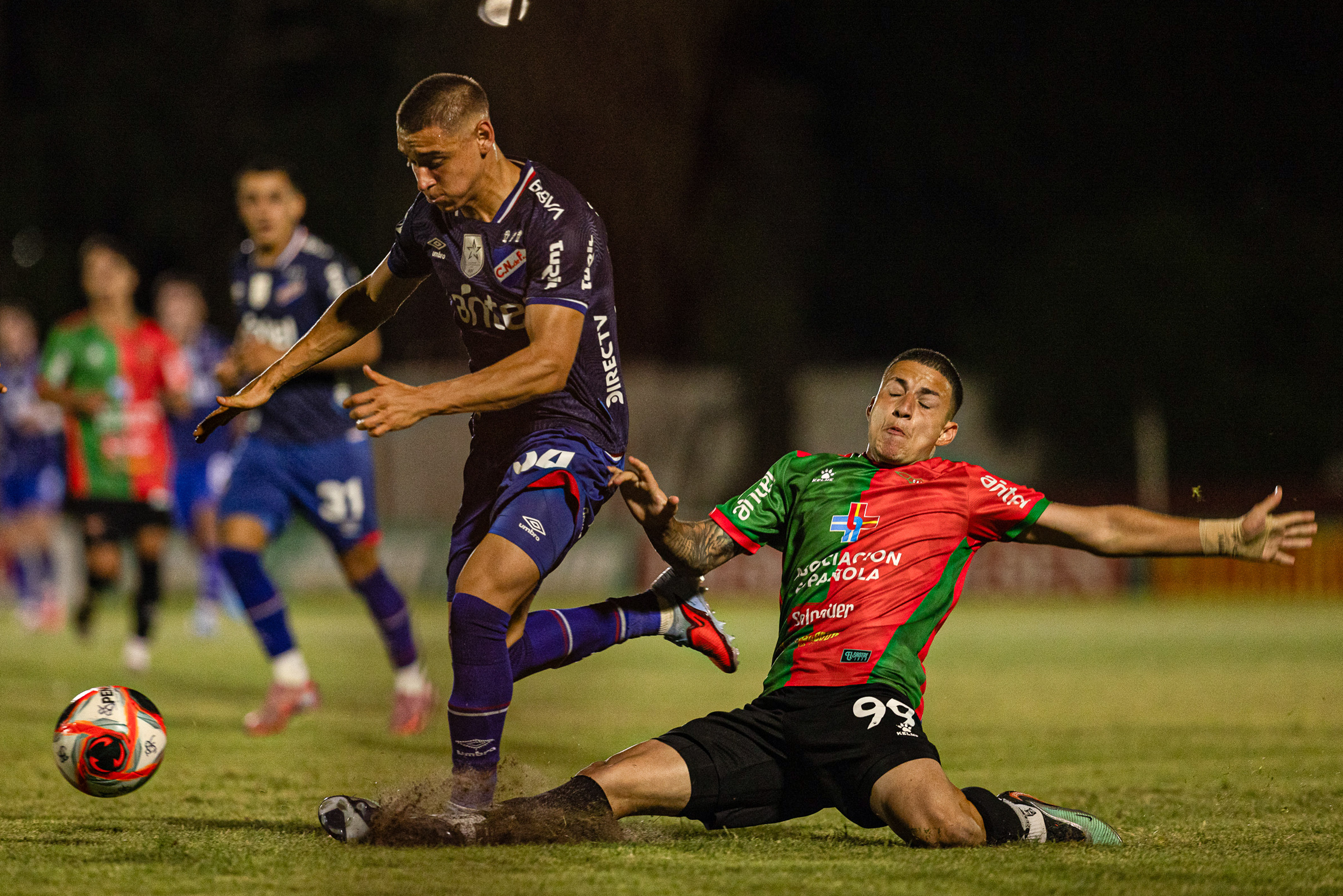 The "Bolso" started the Apertura Tournament on the right foot after defeating the "Sastre" in Florida for the AUF League Florida, Uruguay – February 8, 2026: Gonzalo Reyna (down) of Boston River fight a ball against ...