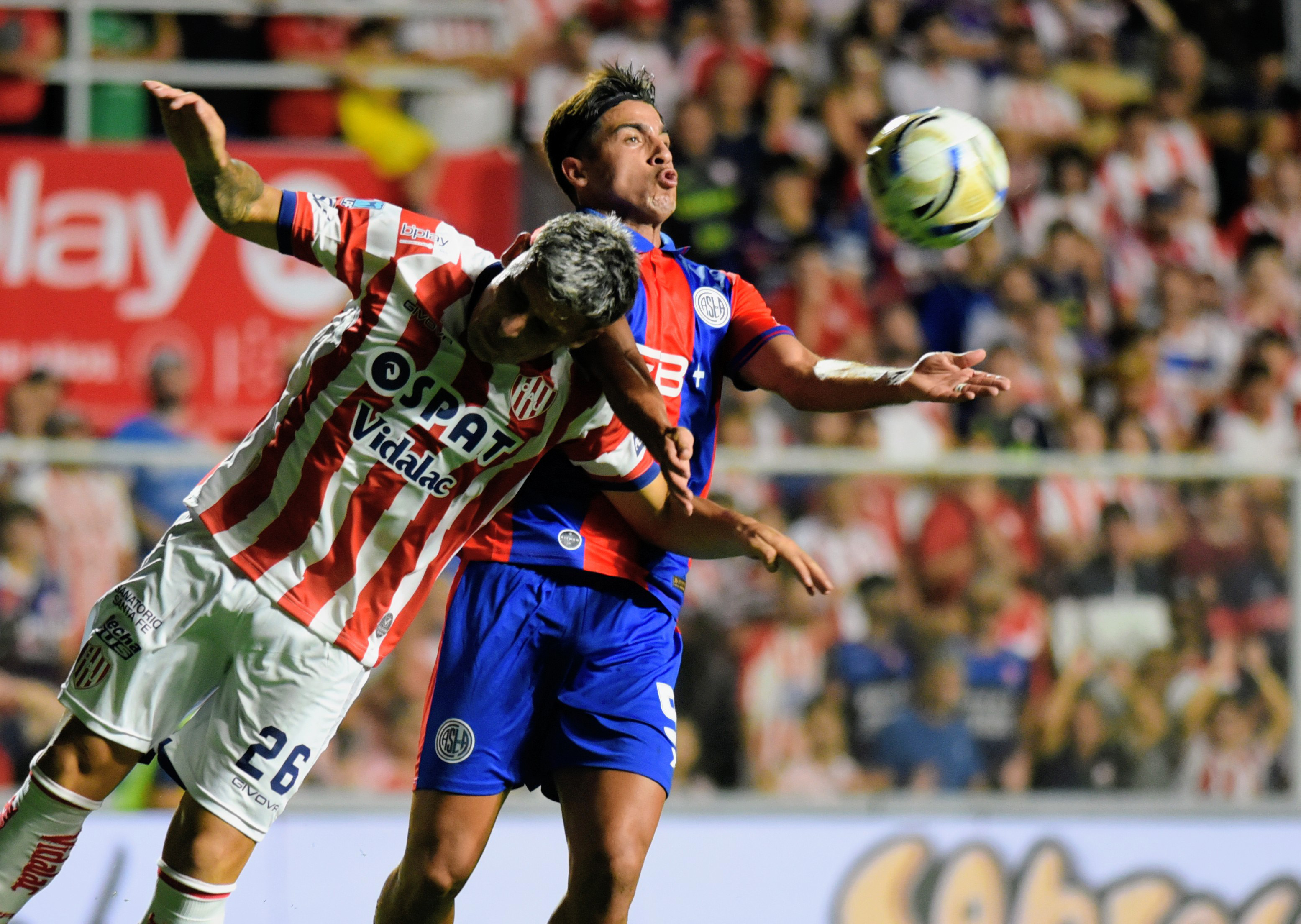 The "Tatengue" hosts the "Ciclón" at the 15 de Abril Stadium in a key Apertura Tournament clash for the Professional League Santa Fe, Argentina – February 13, 2026: The midfielder of San Lorenzo Ignacio Perruzzi dispute...