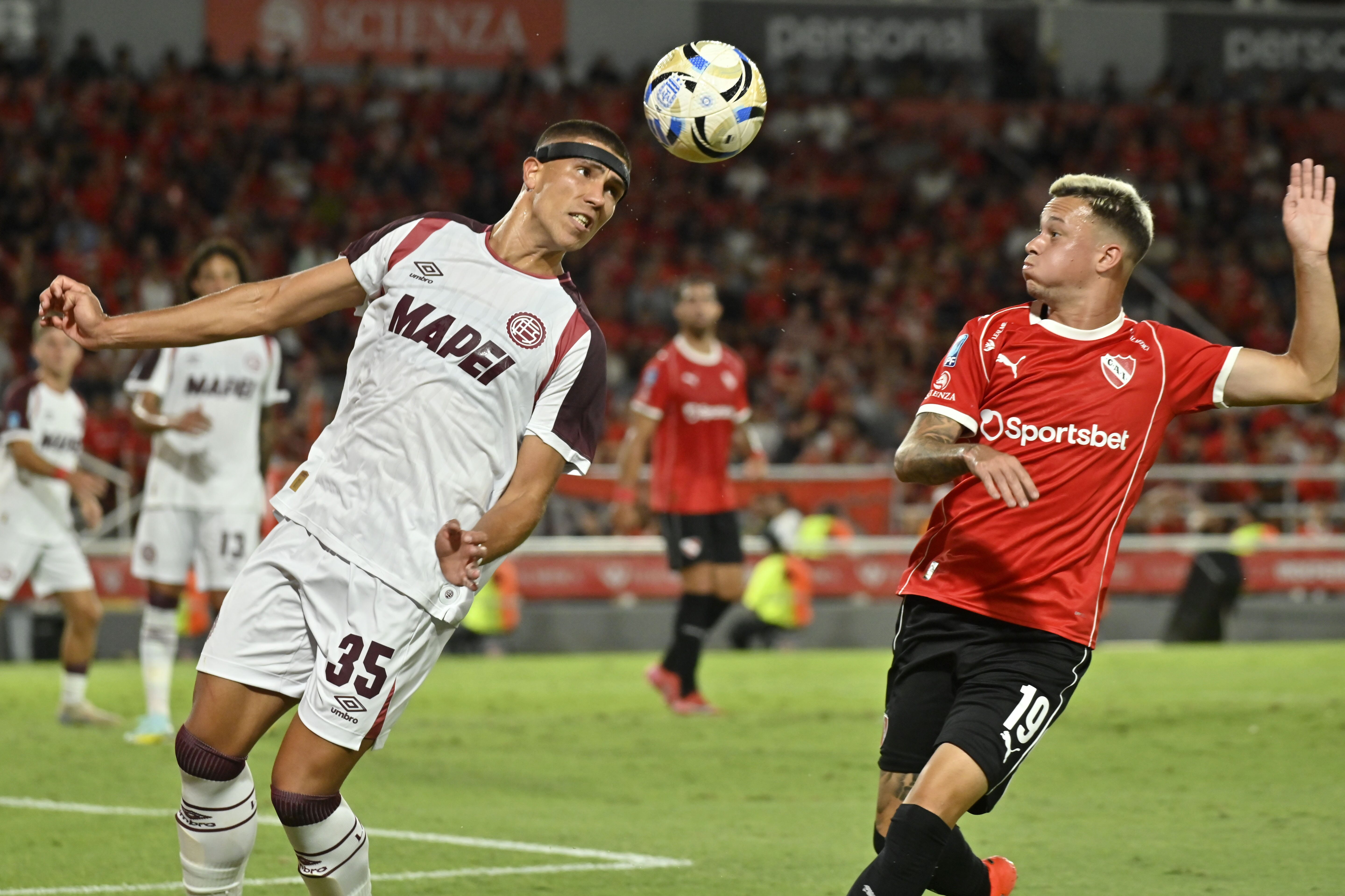 Avellaneda, Argentina – February 13, 2026: Lanús defender Ronaldo Dejesús clears a header in ...