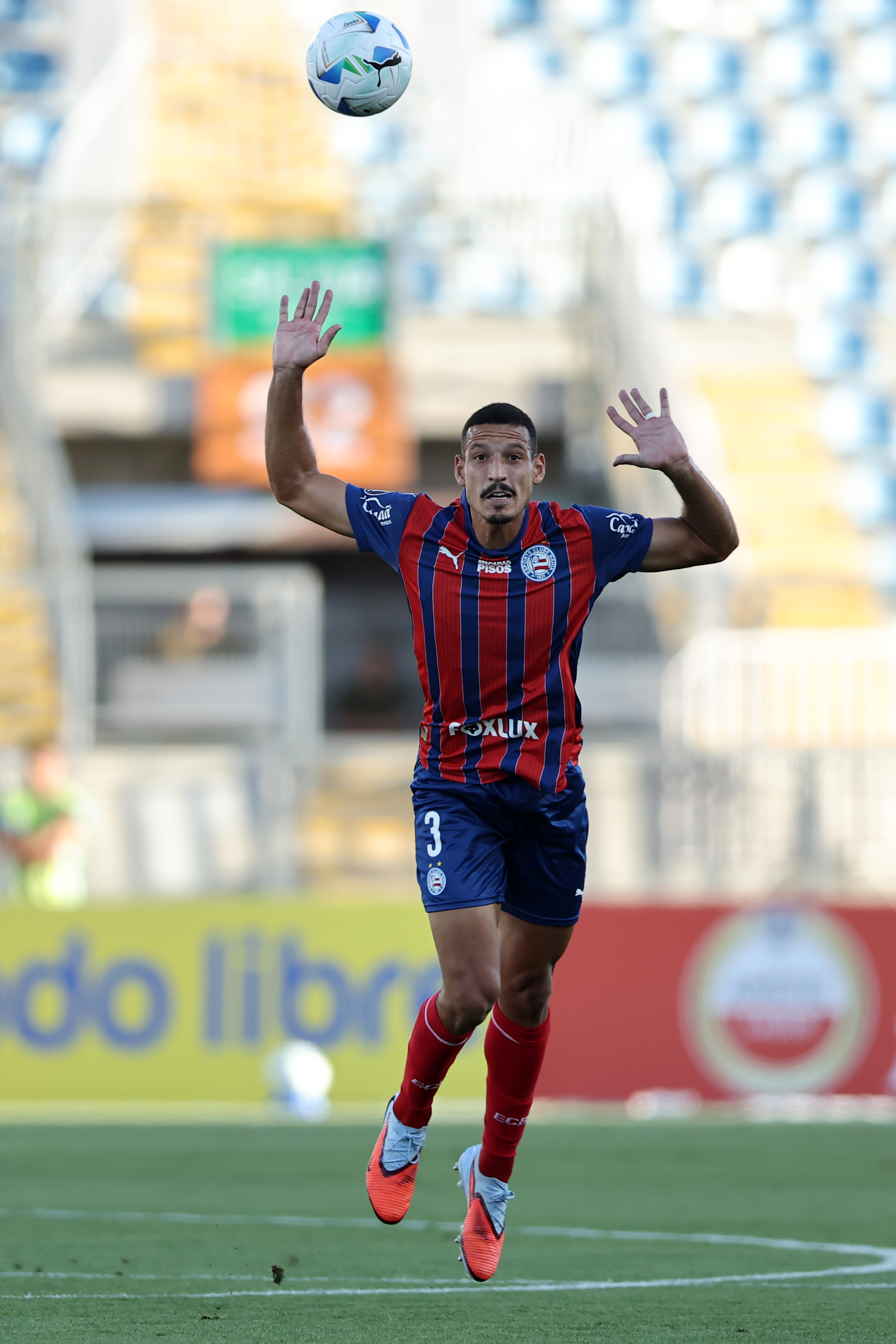 Rancagua, Chile – February 18, 2026: Bahia defender Gabriel Xavier clears the ball with his hea...